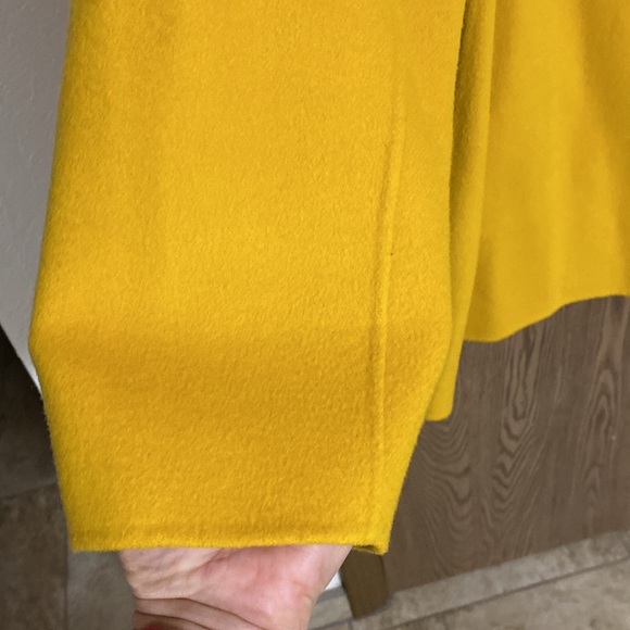 A woman’s mustard, yellow wool coat. - Picture 4 of 6